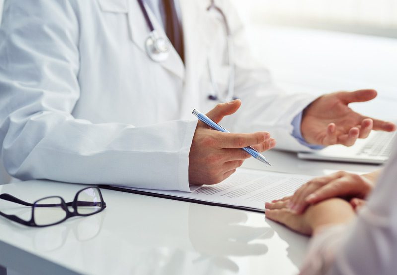 Doctor-explaining-medical-information-to-patient
