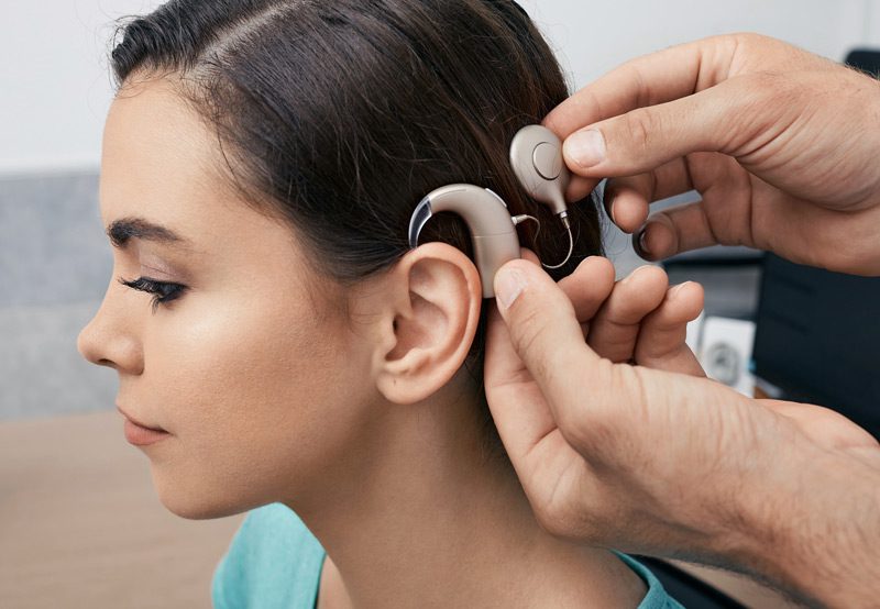 Female-patient-being-fitted-for-a-cochlear-implant Female-patient-being-fitted-for-a-cochlear-implant