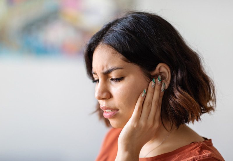 Patient-experiencing-ear-discomfort Patient-experiencing-ear-discomfort
